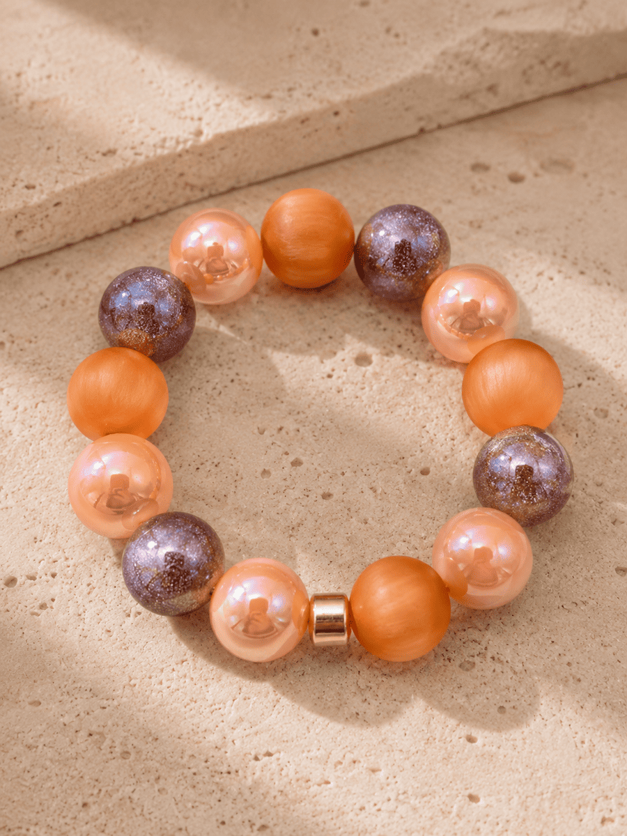 Miracle Mix Armband orange auf Unterlage