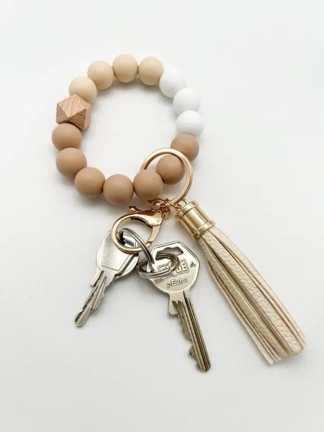 Schlüsselanhänger Handgelenk beige