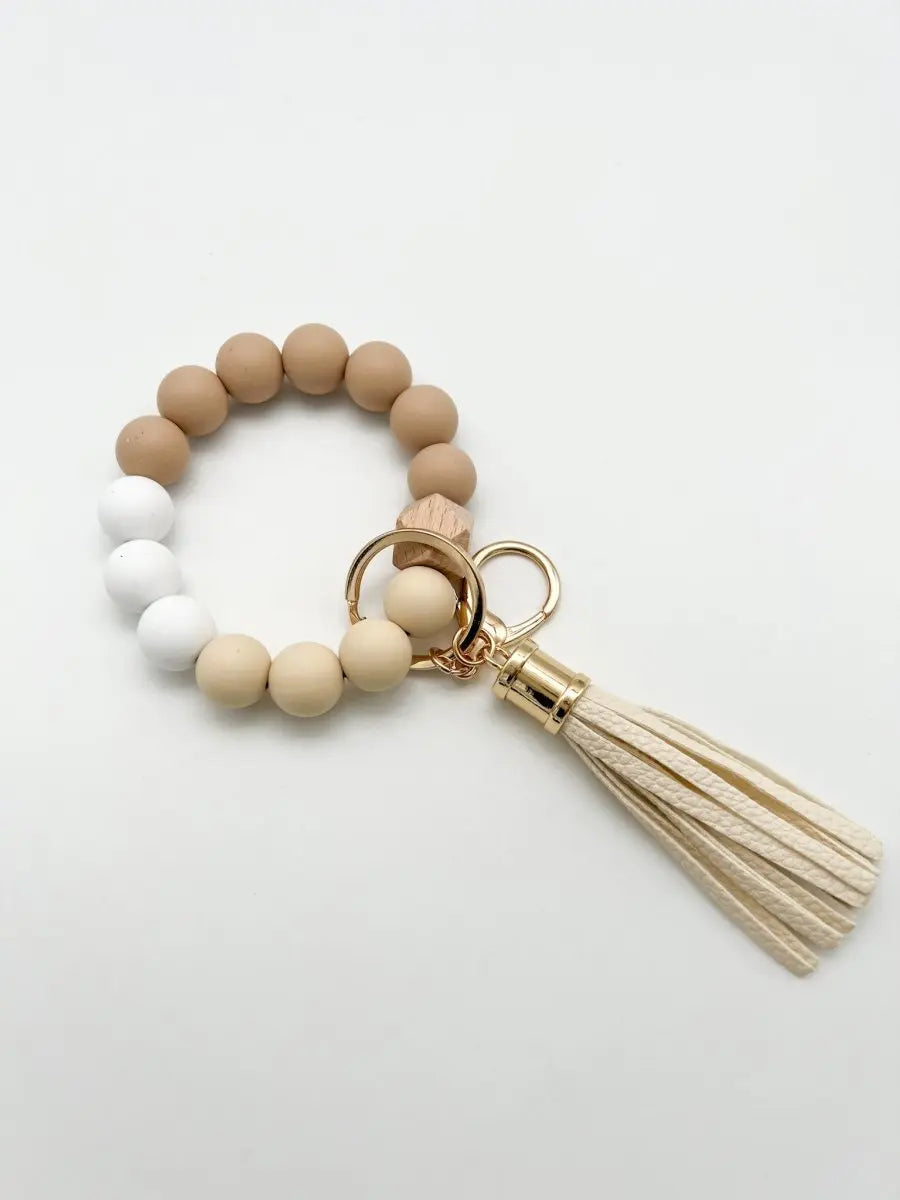 Schlüsselanhänger Handgelenk beige