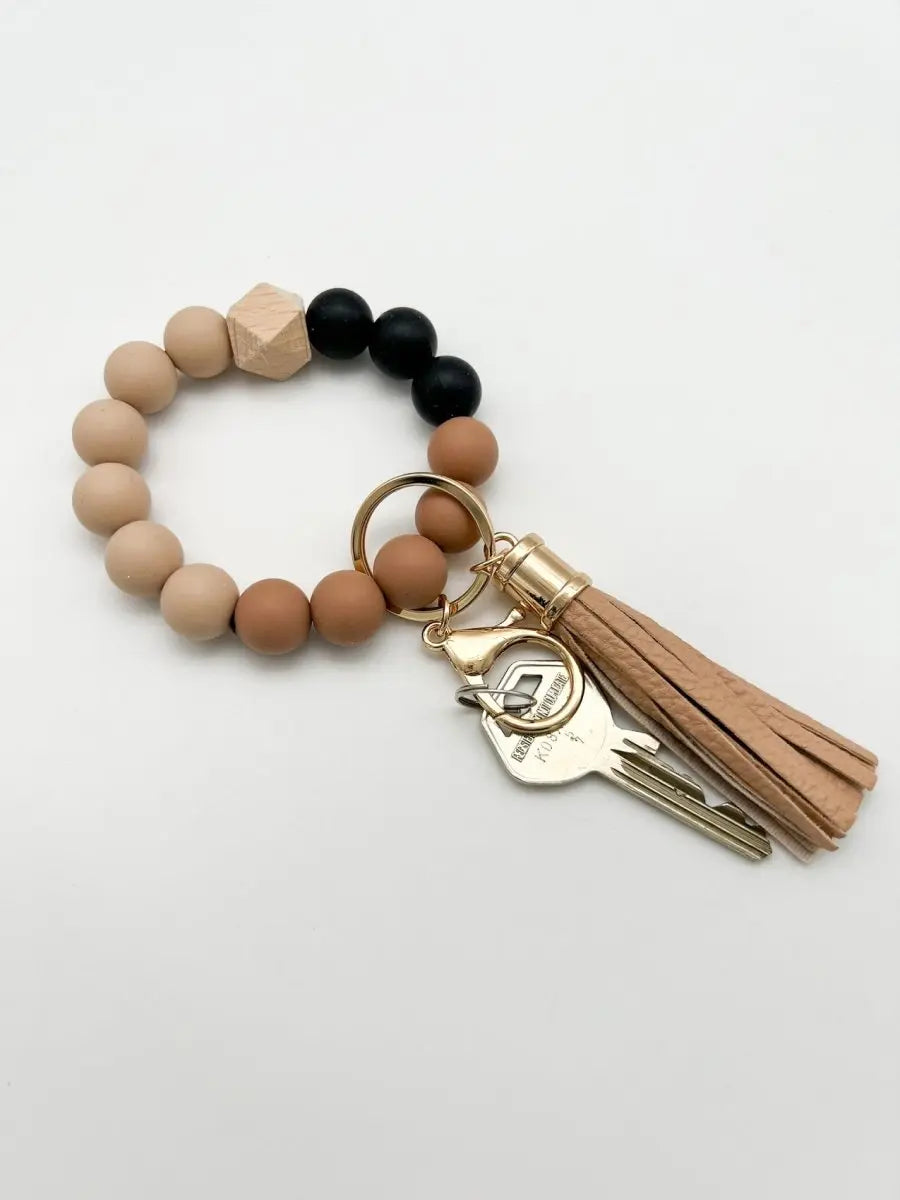 Schlüsselanhänger Handgelenk schwarz braun